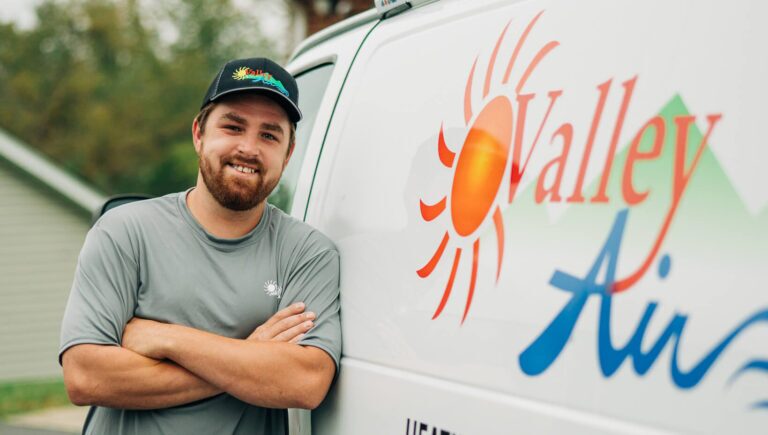 Valley Air Tech next to van